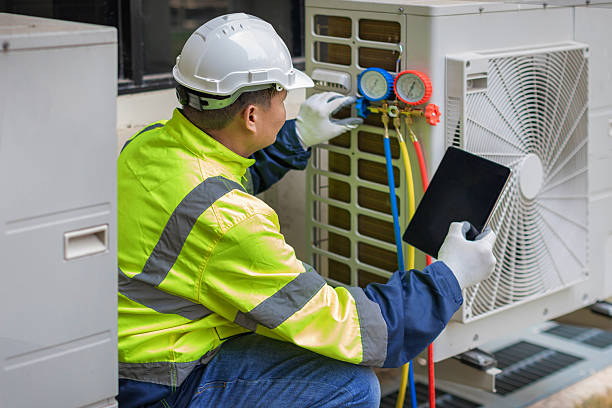 Professional Hvac technician working in Huntsville, AL